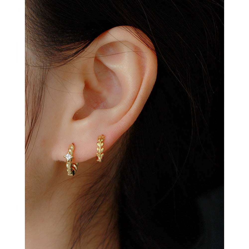 B45  Twist Zircon Hoops