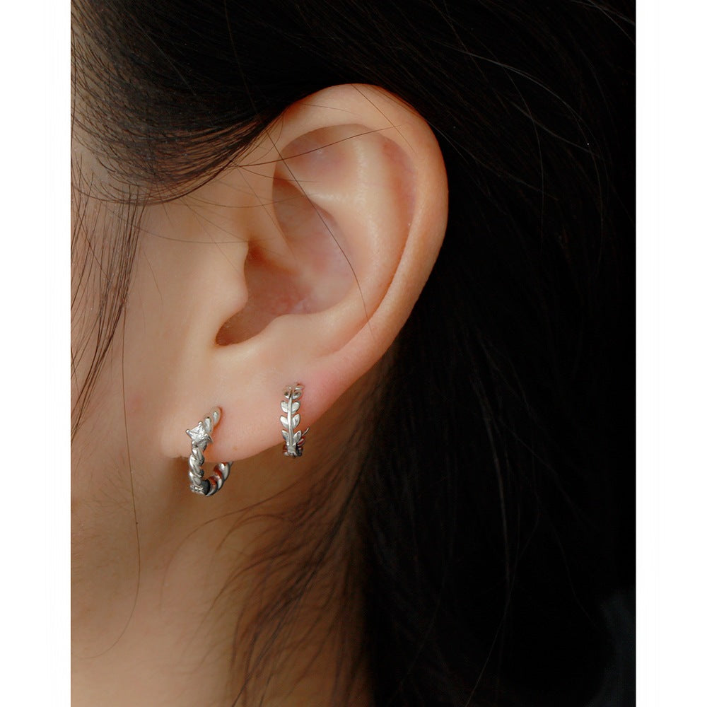 B45  Twist Zircon Hoops